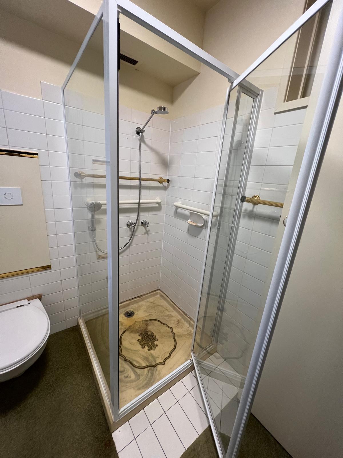 Before - Shower Base Resurfacing